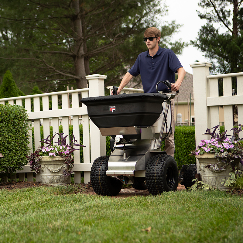 Ride on online mower spreader
